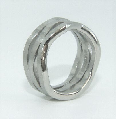 Stunning contemporary wave dessign titanium ring