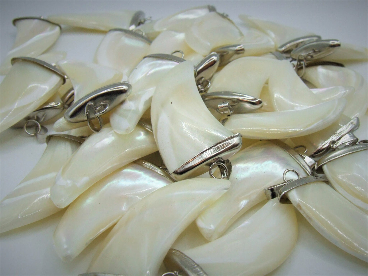 Mother of pearl shark tooth pendant