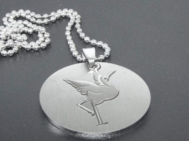 Beautiful large stainless steel bird design pendant