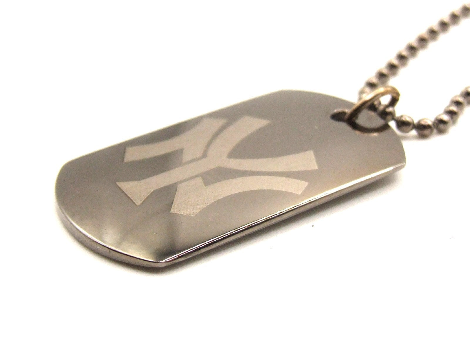 Tungsten dog tag style pendants with various lasered designs